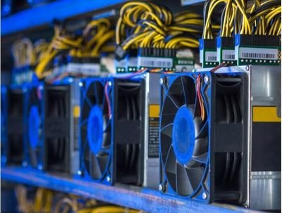 An overview of a modern mining farm showcasing rows of efficient mining rigs in a hosted environment